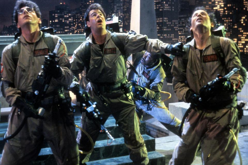 Left to right: Harold Ramis, Dan Aykroyd, Ernie Hudson (background) and Bill Murray in a scene from the film 'Ghostbusters', directed by Ivan Reitman, 1984. (Photo by Columbia Pictures/Getty Images)