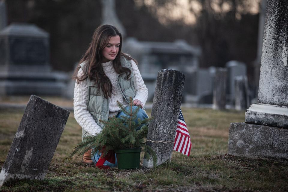 Ellen Cassidy, a Brewster High School senior, has discovered that Private Frank Myers, a soldier in the 54th Massachusetts Colored Volunteers that fought for the Union  Army during the Civil War, was from Patterson, N.Y., and not from Patterson, N.J. where for generations he was believed to have hailed from. Myers was one of only a few Black men to join the Union Army from Putnam County. Cassidy was photographed Dec. 20, 2022 at the grave of Private Myers. 