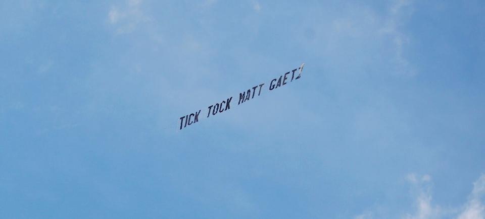 An airplane flies with a banner in tow reading "Tick Tock Matt Gaetz" over the United States Federal Court House on May 17, 2021 in Orlando, Florida. (Photo: Octavio Jones via Getty Images)