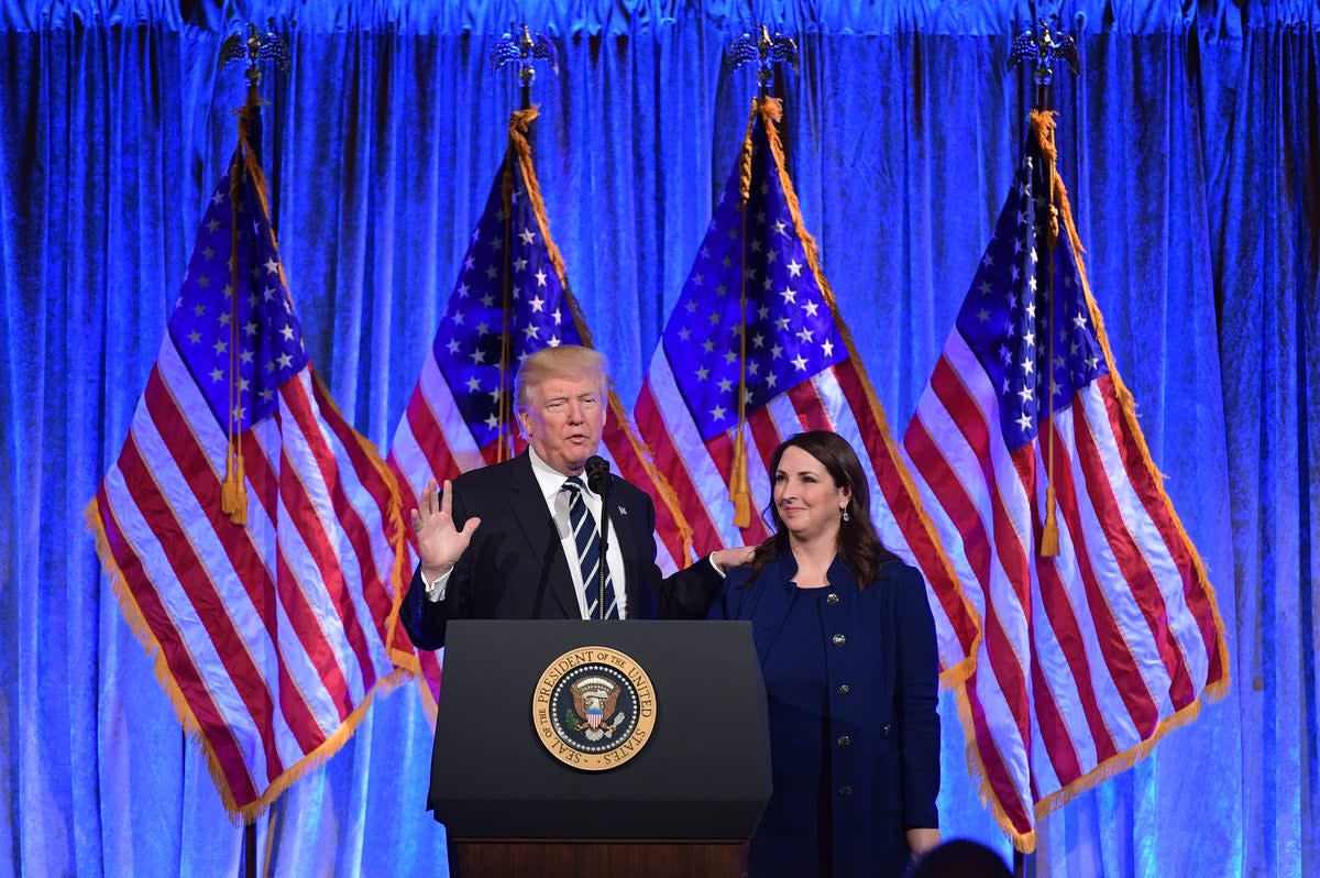 Donald Trump and Ronna McDaniel at a fundraising event in New York City in 2017 (AFP via Getty Images)