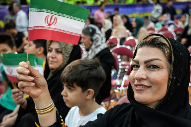 An Alireza Zakani supporter at a rally for the candidate in Tehran (RAHEB HOMAVANDI)