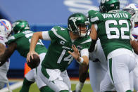 New York Jets quarterback Sam Darnold (14) moves out of the pocket during the first half of an NFL football game against the Buffalo Bills in Orchard Park, N.Y., Sunday, Sept. 13, 2020. (AP Photo/Jeffrey T. Barnes)