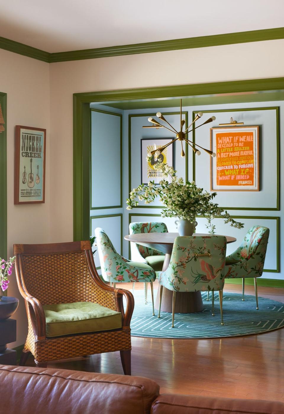 A rattan chair that belonged to the owner’s late husband occupies one corner of the living room. David swapped out the original yellow cushion for a green one to match the ceiling and trim.