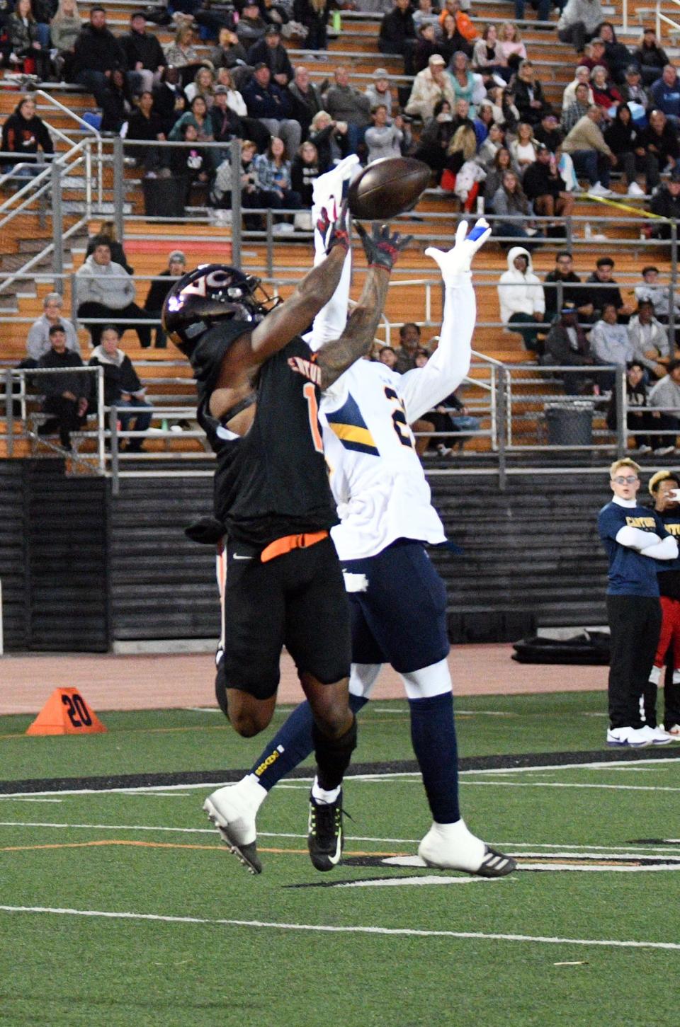 Receiver Chris Reaves pulls down a 34-yard TD pass from Sam Marquez in Ventura College's 23-13 win over visiting College of the Canyons on Saturday night.