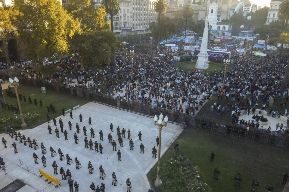 Demonstrators march to the Casa Rosada presidential palace demanding more funding for public universities and to protest against austerity measures proposed by President Javier Milei, in Buenos Aires, Argentina, Tuesday, April 23, 2024. (AP Photo/Natacha Pisarenko)