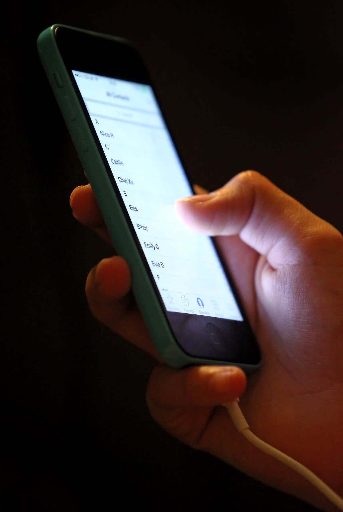 A teenage girl using a mobile phone (Chris Radburn/PA) (PA Archive)