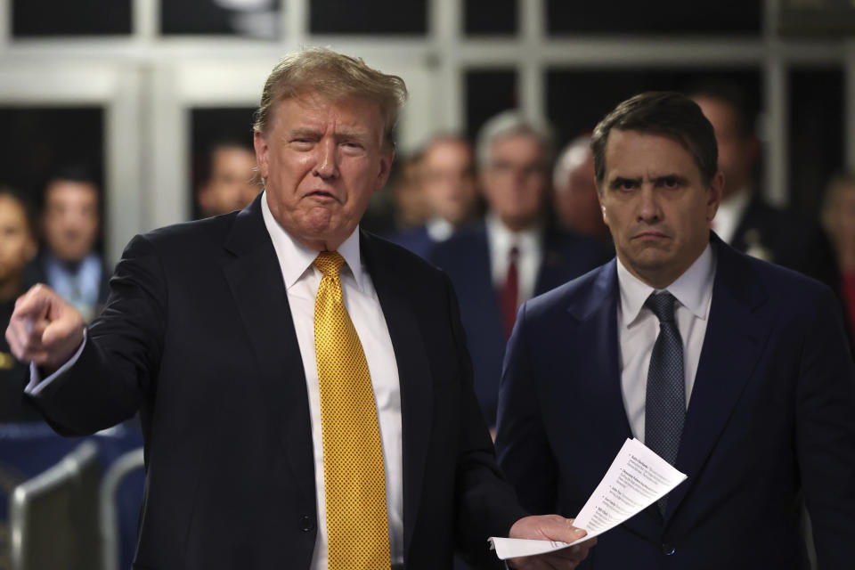 Former President Donald Trump speaks alongside his attorney Todd Blanche following the day's proceedings in his trial Tuesday, May 21, 2024, in Manhattan Criminal Court in New York. (Michael M. Santiago/Pool Photo via AP)