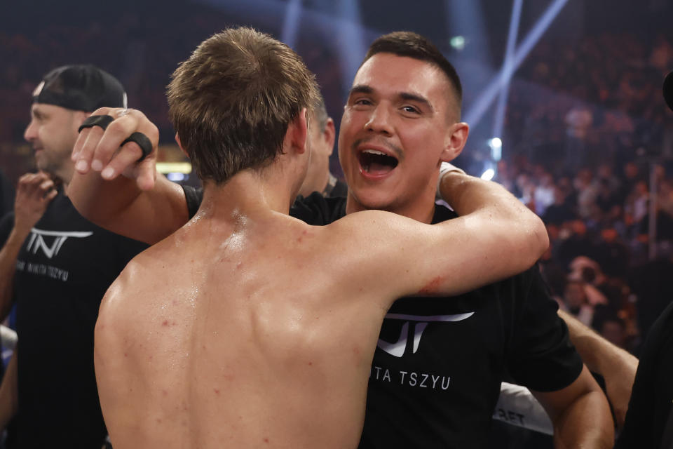 Nikita Tszyu, pictured here celebrating with brother Tim after his win over Mason Smith.