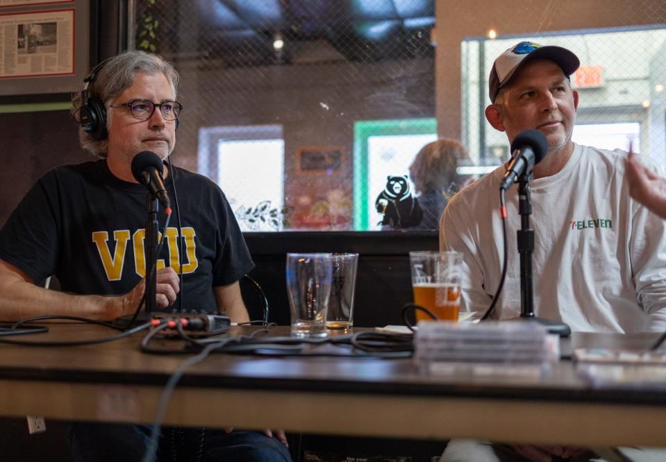 Rockin’ the Suburbs podcast founders Jim Lenahan and Patrick Foster during a live podcast taping at Suburbs Fest 2022 at 7 Locks Brewing in Rockville, Maryland on Sept. 30, 2022.