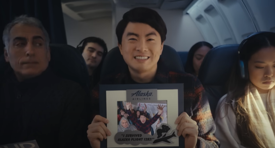 The sketch joked that a commemorative photo, similar to a theme park ride, would be given at the end of flights (Saturday Night Live/YouTube)
