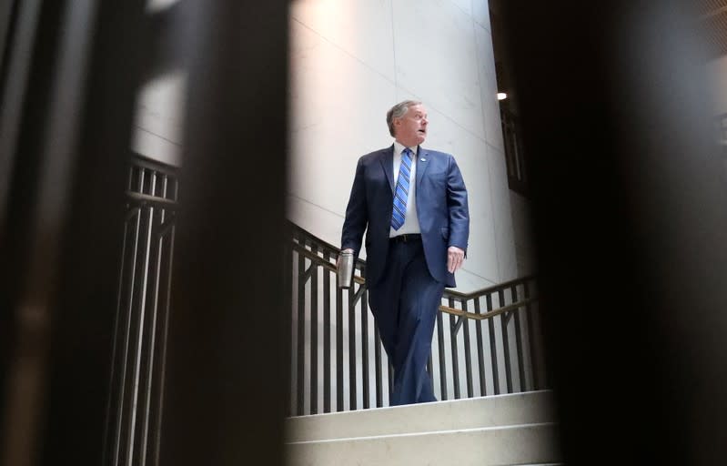 FILE PHOTO: Rep. Mark Meadows looks back as he arrives at the impeachment inquiry against U.S. President Donald Trump, in Washington