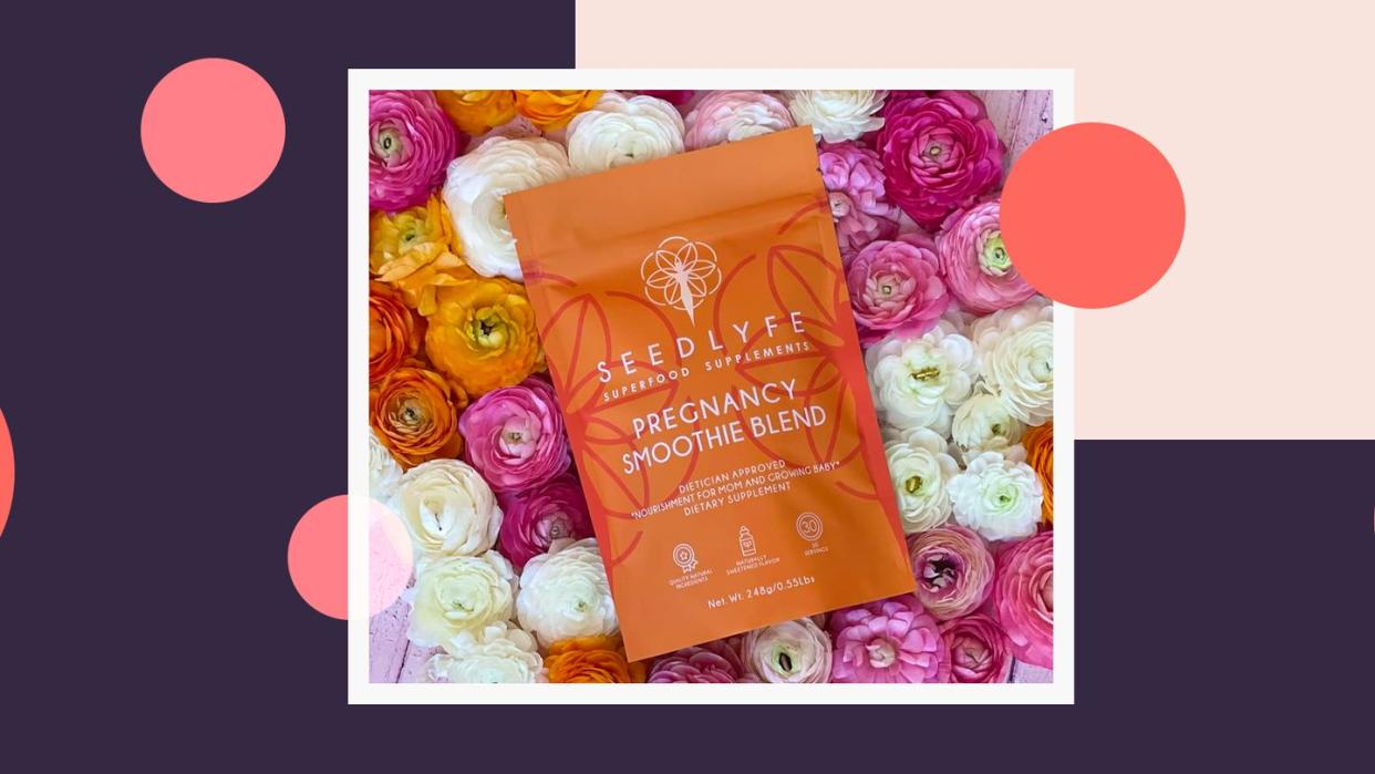 bag of pregnancy smoothie superfood blend on a bed of flowers