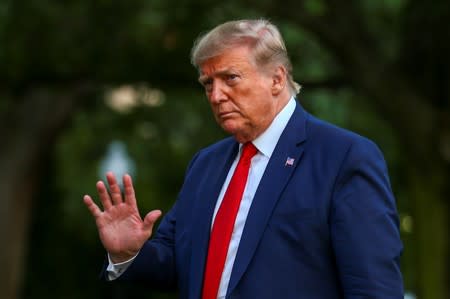 U.S. President Donald Trump returns after travelling to the AMVETS convention in Kentucky, at the South Lawn of the White House in Washington