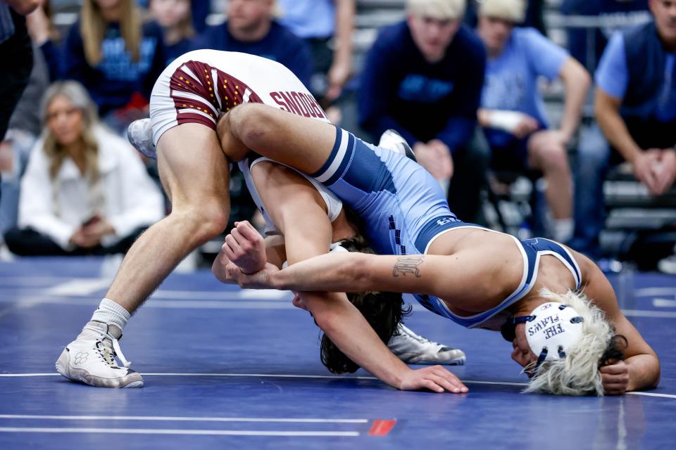 Blackwell’s Sabon Batton, left, attempts to escape while wrestling Marlow's Marcus Williams during the Class 3A dual state tournament finals Saturday night at Stride Bank Center in Enid.