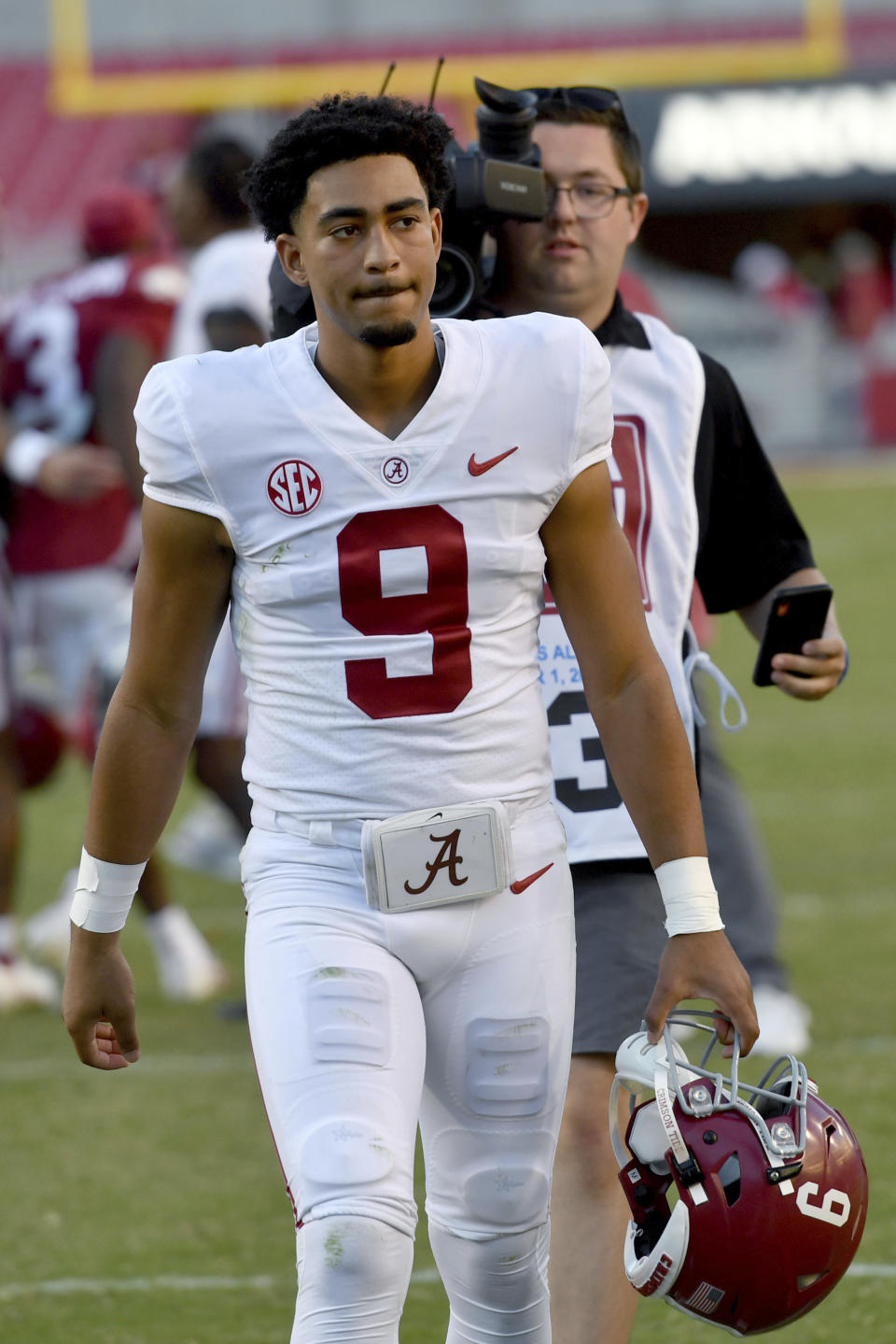 Alabama quarterback Bryce Young (9) heads to the locker room after playing Arkansas during an NCAA college football game Saturday, Oct. 1, 2022, in Fayetteville, Ark. (AP Photo/Michael Woods)