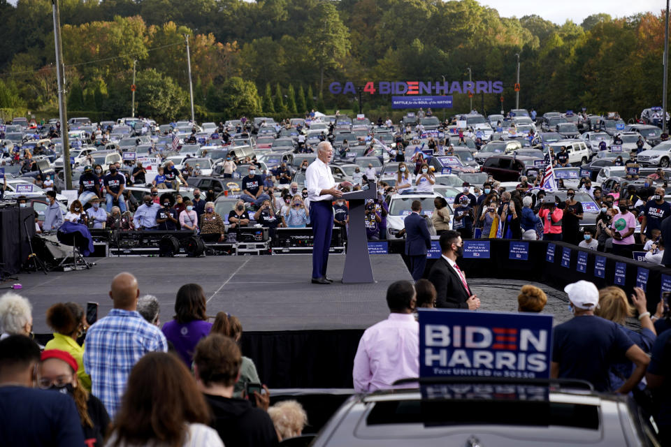 FILE - Democratic presidential candidate former Vice President Joe Biden speaks at a drive-in rally in Atlanta, on Oct. 27, 2020. After a historic season, winter is coming at the drive-in. Summer and early fall have seen the old drive-in transformed into a surprisingly elastic omnibus of pandemic-era gathering. . (AP Photo/Andrew Harnik, File)