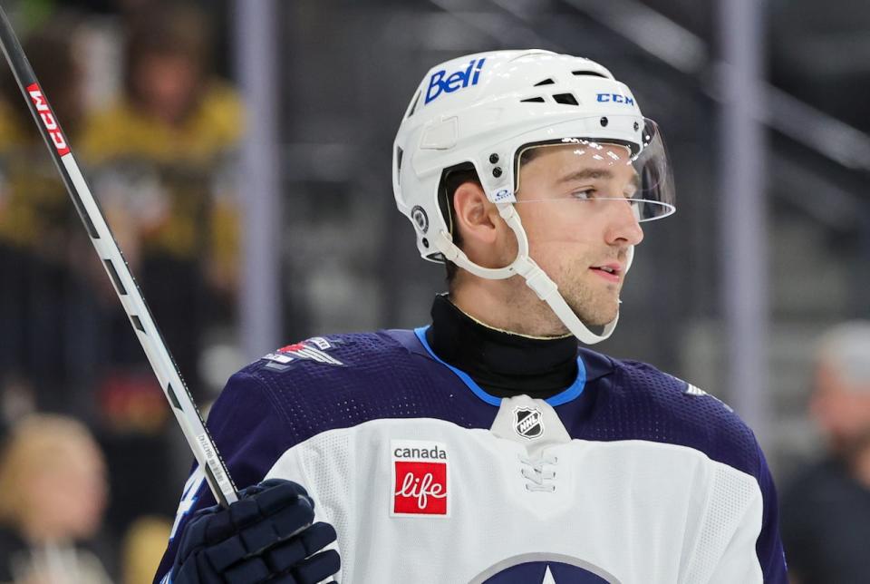 Neal Pionk of the Winnipeg Jets wears a neck guard in the second period of a game against the Vegas Golden Knights on Nov. 2 in Las Vegas. (Ethan Miller/Getty Images - image credit)