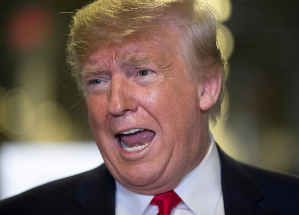 President Donald Trump talks to reporters about the impeachment hearing while touring Flextronics on Nov. 20, 2019, Austin, Texas.