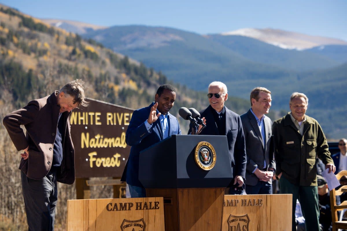 Colorado Democrat Joe Neguse with President Biden in Red Cliff, Colorado in 2022.  Rep. Neguse has introduced legislation to improve the conditions for federal firefighters in the House (Getty Images)