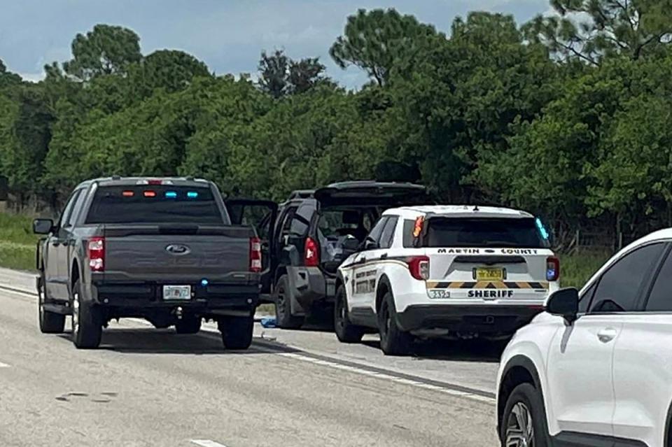 Police vehicles stop a car, after reports of multiple shots being fired near Republican presidential candidate Donald Trump's golf course, near Palm City, Florida, U.S., September 15, 2024 (via REUTERS)