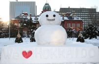 A snowman stands at the Hokkaido Government Office Building for Sapporo Snow Festival 2008.