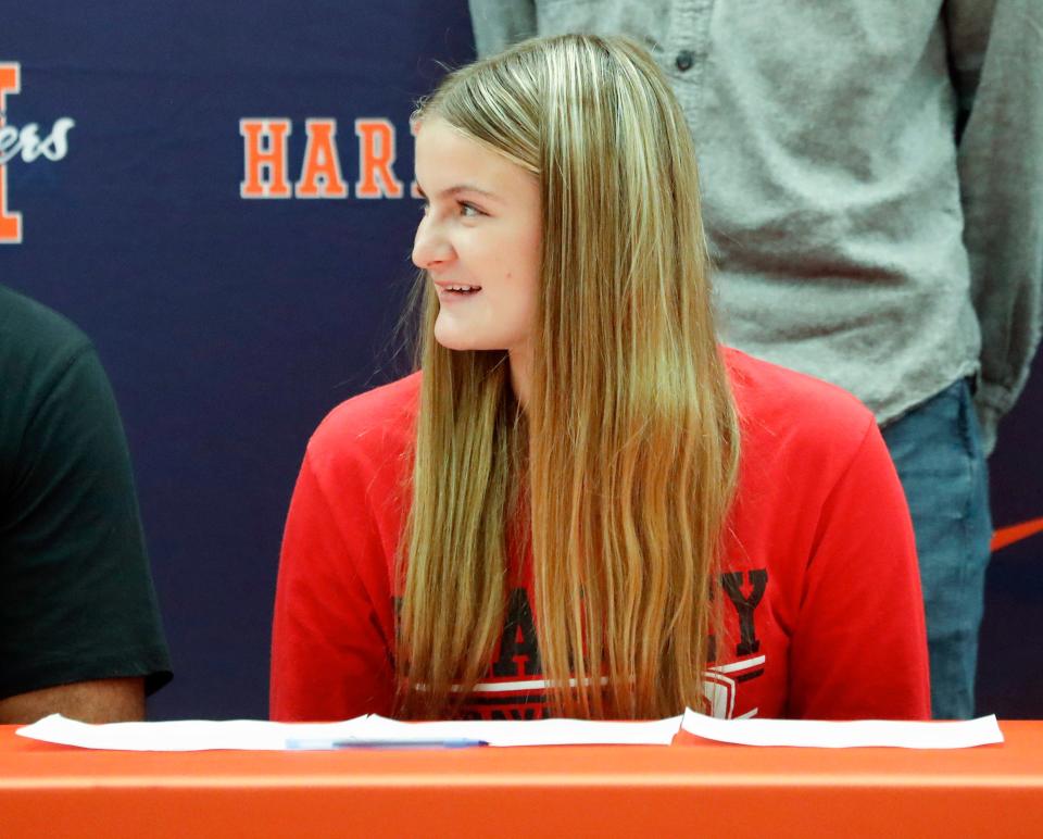 Harrison Raider Ava Mobley smiles during signing day, Wednesday, Nov. 8, 2023, at Harrison High School in West Lafayette, Ind. Mobley signed to Bradley for softball.