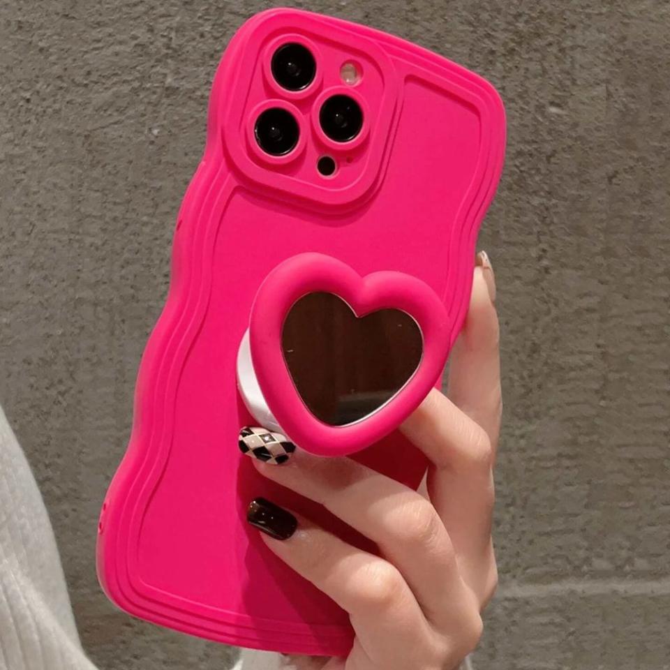 <p><a href="https://go.redirectingat.com?id=74968X1596630&url=https%3A%2F%2Fus.shein.com%2FPlain-Phone-Case-With-Heart-Shaped-Mirror-Stand-Out-Phone-Grip-p-12359685.html%3FmallCode%3D1%255C&sref=https%3A%2F%2Fwww.bestproducts.com%2Fparenting%2Fkids%2Fg43377503%2Fteen-tiktok-gifts%2F" rel="nofollow noopener" target="_blank" data-ylk="slk:Shop Now;elm:context_link;itc:0;sec:content-canvas" class="link ">Shop Now</a></p><p>Plain Phone Case With Heart-Shaped Mirror Phone Grip</p><p>shein.com</p><p>$2.70</p>