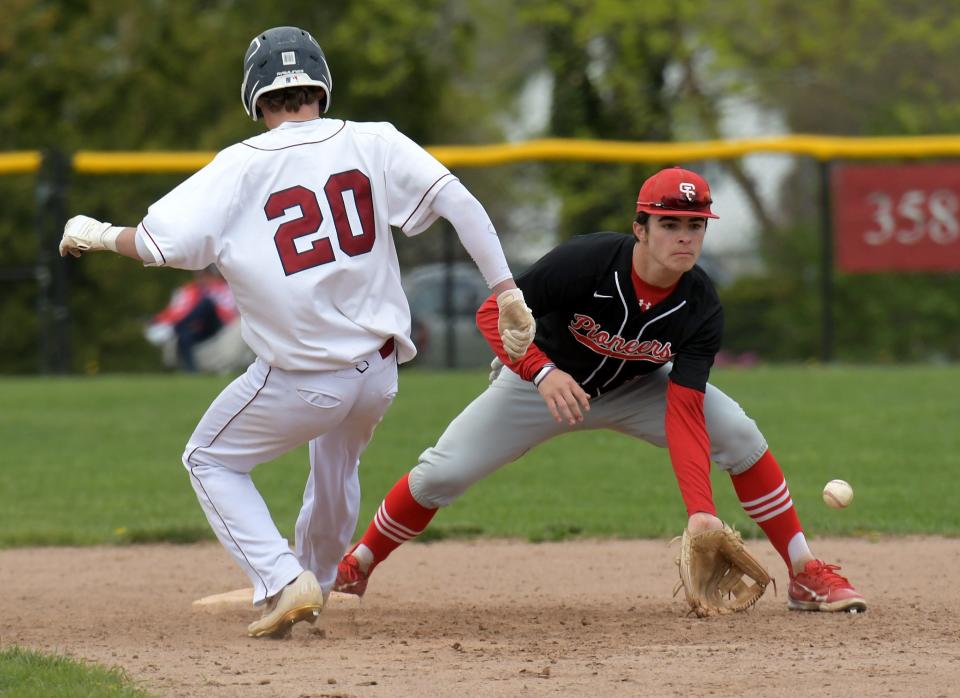 Westborough's Owen Tarasiak is forced out at second base by St. John's shortstop Andrew Gardner.