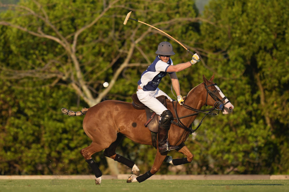 Britain's Prince Harry participates in the 2024 Royal Salute Polo Challenge to Benefit Sentebale, Friday, April 12, 2024, in Wellington, Fla. (AP Photo/Rebecca Blackwell)