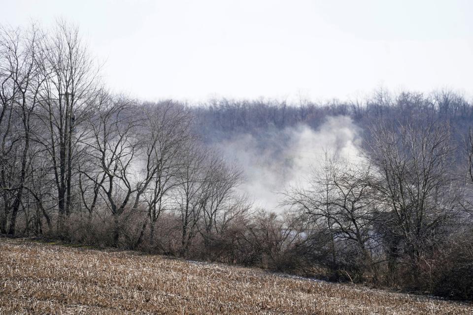 Smoke from the Feb. 3 train derailment could be seen in East Palestine, Ohio, on Feb. 5.
