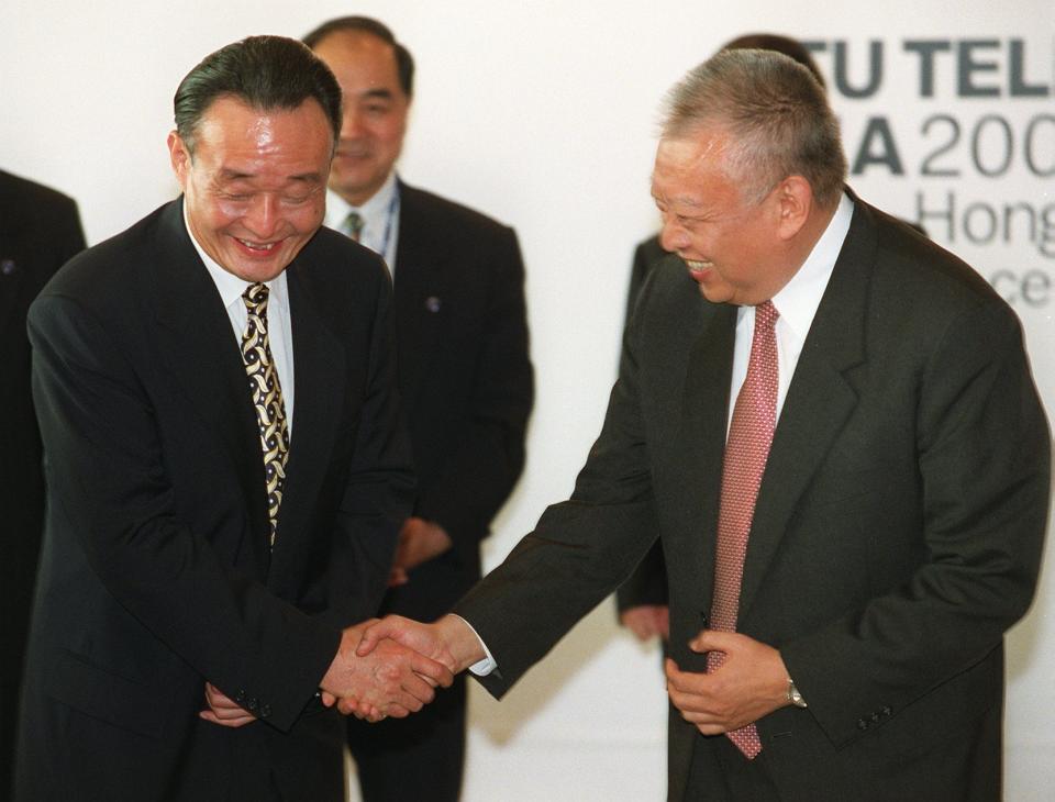 Wu Bangguo (left) and Tung Chee-hwa officiate the opening ceremony of ITU Telecom Asia 2000 at Hong Kong Convention and Exhibition Centre.  ***NOT FOR ADVERTISING USE*** (Photo by OLIVER TSANG/South China Morning Post via Getty Images)