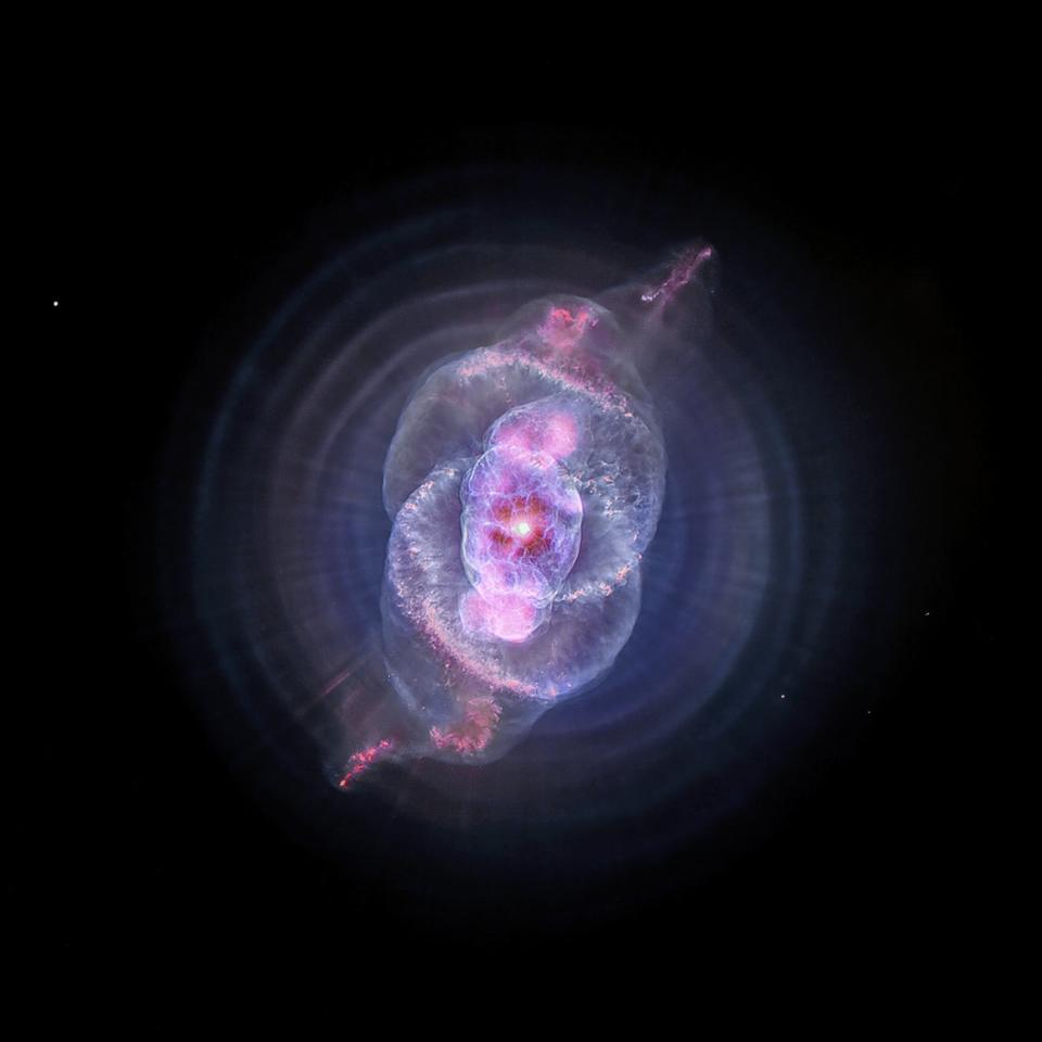 Eventually, our Sun will run out of fuel and die (though not for another 5 billion years). As it does, it will become like the object seen here, the Cat’s Eye Nebula, which is a planetary nebula. A fast wind from the remaining stellar core rams into the ejected atmosphere and pushes it outward, creating wispy structures seen in X-rays by Chandra and optical light by the Hubble Space Telescope. <em>Credit: X-ray: NASA/CXC/SAO; Optical: NASA/ESA/STScI; Image Processing: NASA/CXC/SAO/J. Major, L. Frattare, K. Arcand</em>