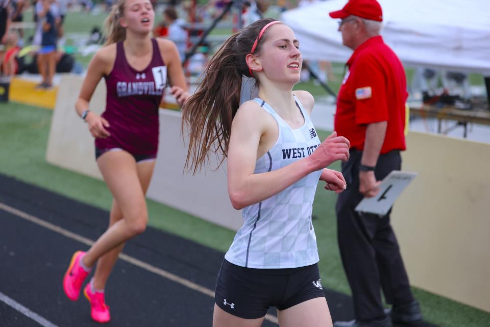 West Ottawa's Arianne Olson wins the 3,200 meters at the OK Red Conference meet on Friday, May 12, 2023, at Hudsonville.