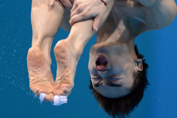 China's Qin Kai in action during the Men's 3m Springboard Semi Final Round at the Aquatic Centre