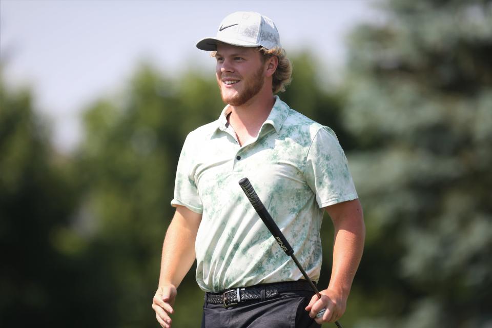 Yorktown senior Gabe Reedy walks off with a smile after being eliminated in the final playoff round in the IHSAA Muncie Central boys golf regional tournament at The Players Club on Thursday, June 8, 2023.