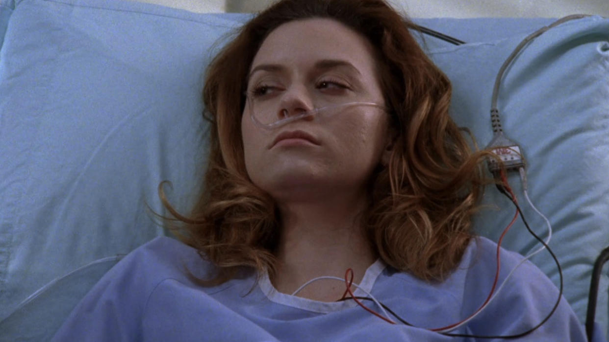  Peyton Sawyer Lucas lies in a hospital bed after having her baby on One Tree Hill. 