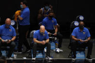 UCLA coach Mick Cronin, center, watches during the final minute of the team's NCAA college basketball game against San Diego State, Wednesday, Nov. 25, 2020, in San Diego. (AP Photo/Gregory Bull)