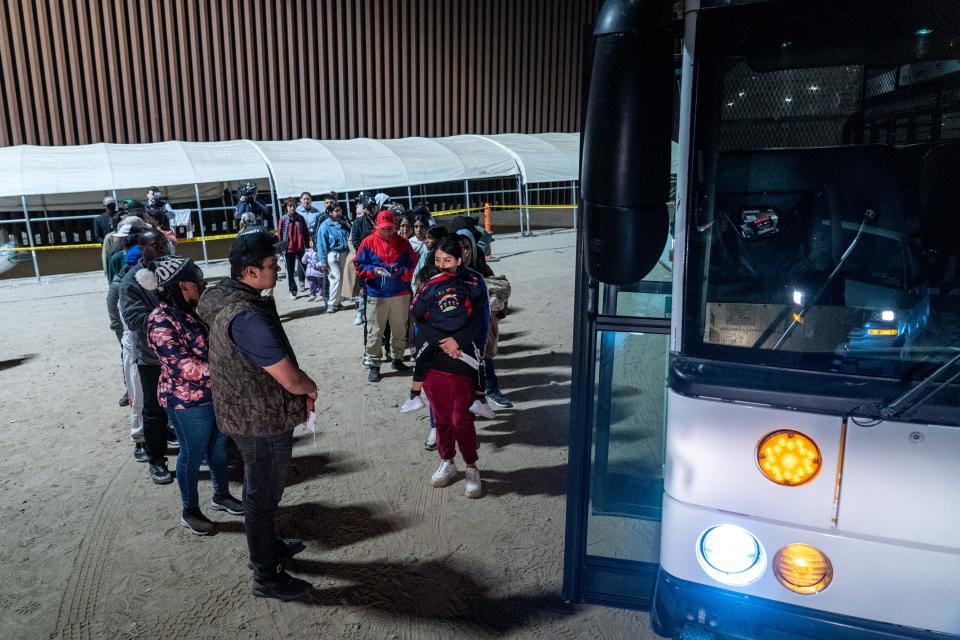 Migrants and asylum seekers are detained by U.S. Border Patrol agents after crossing the U.S.-Mexico border in Somerton, near the Cocopah Indian Tribe's reservation boundaries, on May 11, 2023.