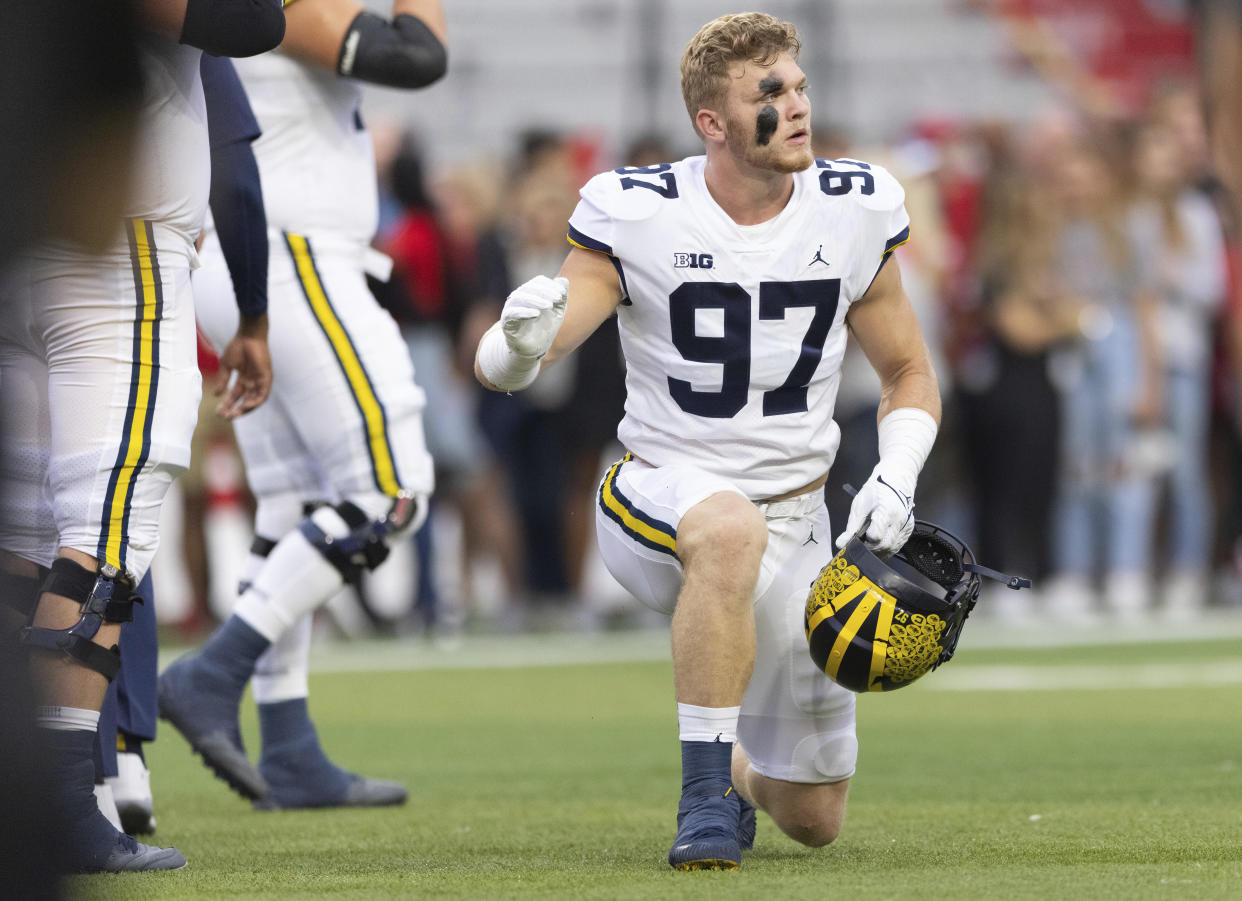 Michigan defensive end Aidan Hutchinson (97) warms up before playing against Nebraska in an NCAA college football game Saturday, Oct. 9, 2021, at Memorial Stadium in Lincoln, Neb. (AP Photo/Rebecca S. Gratz)