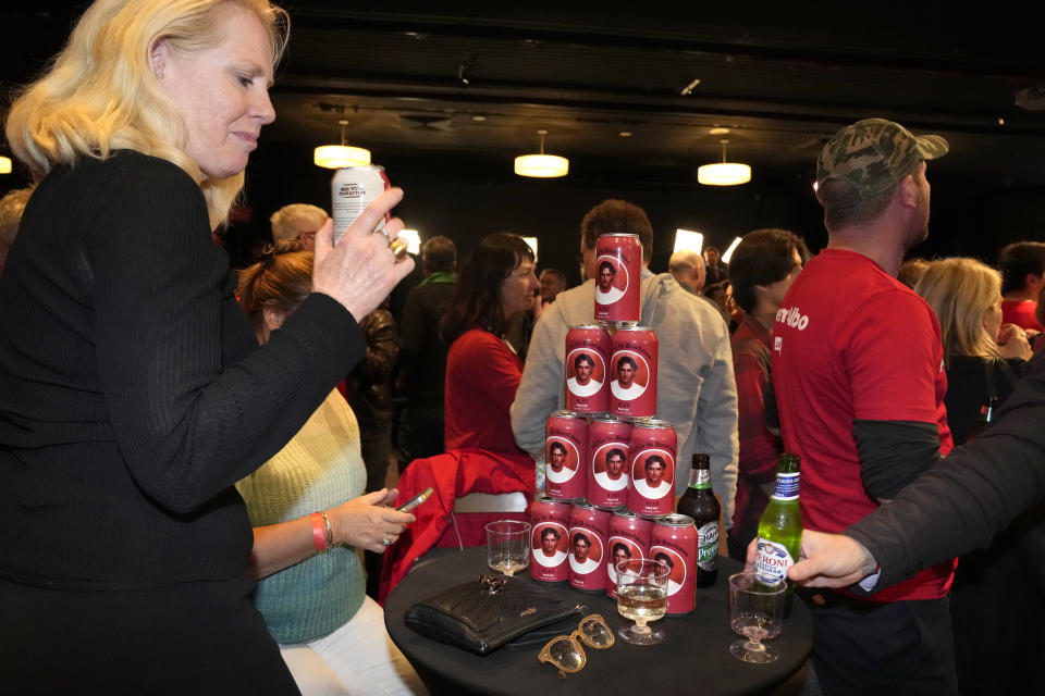 Albo branded beer cans are stacked on a table at a Labor Party event following the close of the polling places in Sydney, Australia, Saturday, May 21, 2022. Also is the nickname of Labor Party Leader Anthony Albanese. Australians voted following a six-week election campaign that has focused on pandemic-fueled inflation, climate change and fears of a Chinese military outpost being established less than 1,200 miles off Australia's shore. (AP Photo/Rick Rycroft)