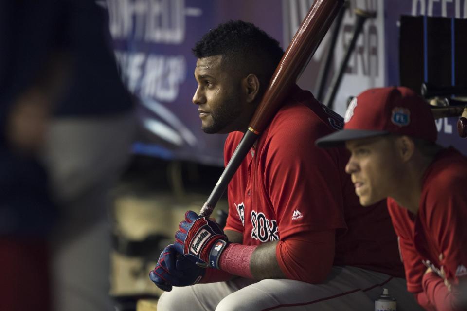 Pablo Sandoval #48 of the Boston Red Sox watches from the bench against the Toronto Blue Jays on April 1, 2016 at Olympic Stadium in Montreal, Quebec.