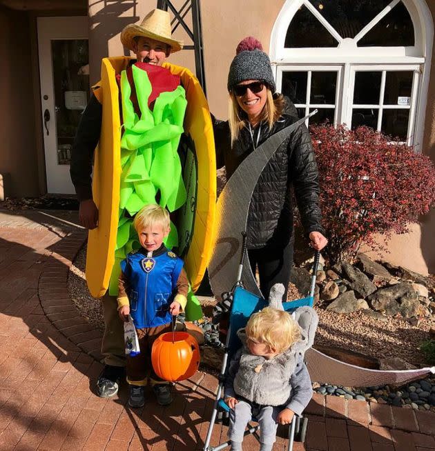 The author, her husband and two children on Halloween 2017, a few hours after her doctor diagnosed her with breast cancer. 