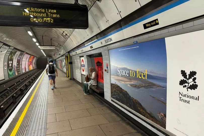 National Trust poster of Dinas Oleu, Barmouth, at Euston underground station in London