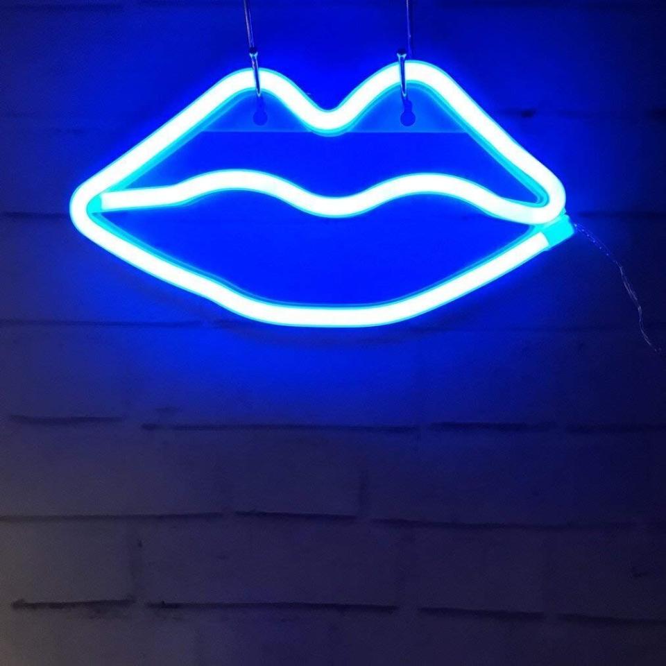 This small lip neon sign is available in blue, pink and red. <strong><a href="https://amzn.to/2BXbMED" target="_blank" rel="noopener noreferrer">Find it for $13 on Amazon</a>.</strong>