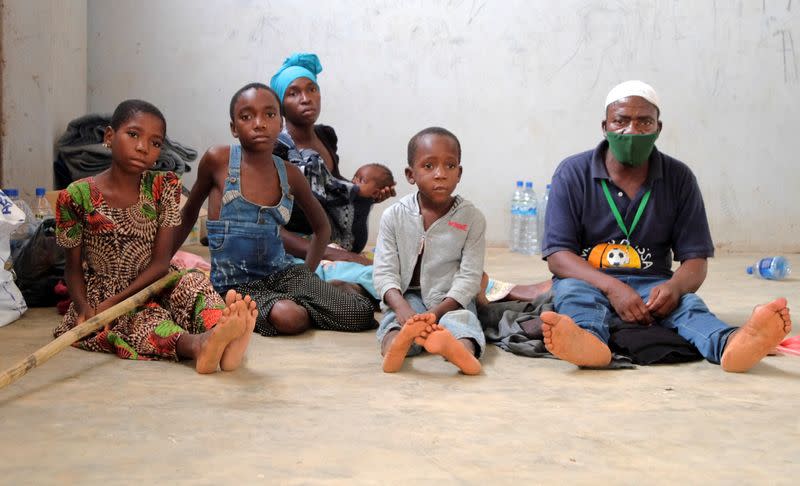 People who fled an attack on the town of Palma are seen at a temporary displacement centre in Pemba