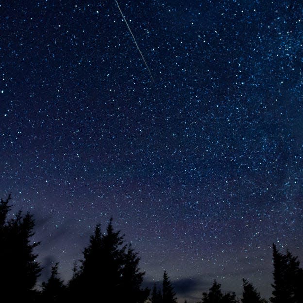 In this 30 second exposure, a meteor streaks across the sky during the annual Perseid meteor shower Thursday, Aug. 13, 2015, in Spruce Knob, West Virginia. Photo Credit: (NASA/Bill Ingalls)