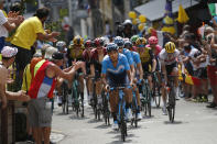 Spain's Mikel Landa, center, leads the breakaway group as he climbs the Tourmalet pass during the fourteenth stage of the Tour de France cycling race over 117.5 kilometers (73 miles) with start in Tarbes and finish at the Tourmalet pass, France, Saturday, July 20, 2019. (AP Photo/ Christophe Ena)