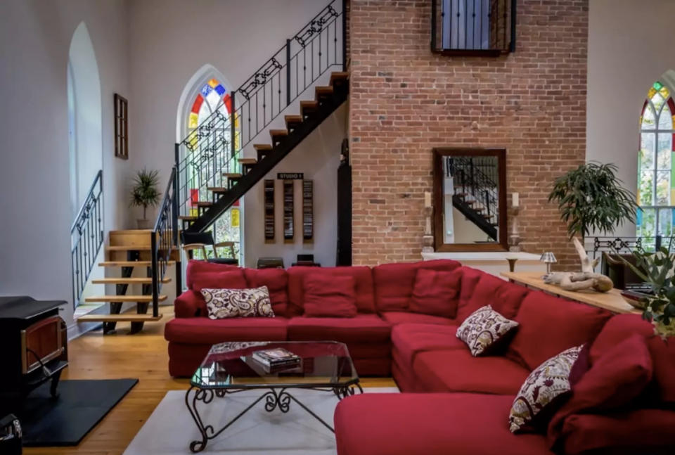 <p>The “Manilla Church” has four bedrooms and 5000 square feet. The open-concept design highlights the 30-foot ceilings, Douglas Firm beams and stain-glass windows. </p>