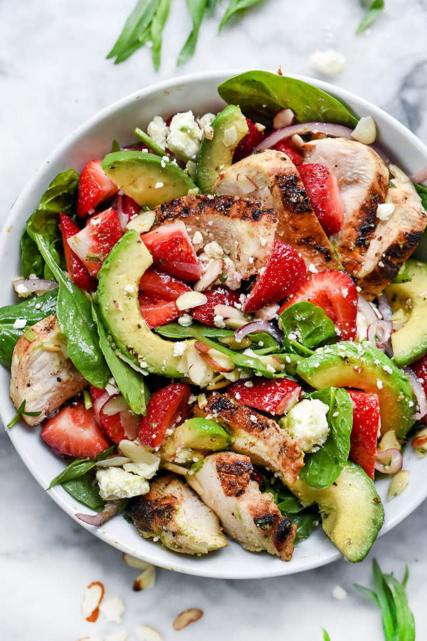 Yes, strawberries and chicken do, in fact, go together. Recipe: Strawberry, Avocado, and Chicken Spinach Salad
