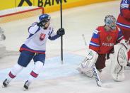 Slovakia's Miroslav Satan celebrates Zdeno Chara's goal against team Russia during a final game of the IIHF International Ice Hockey World Championship in Helsinki on May 20, 2012. AFP PHOTO/ ALEXANDER NEMENOVALEXANDER NEMENOV/AFP/GettyImages